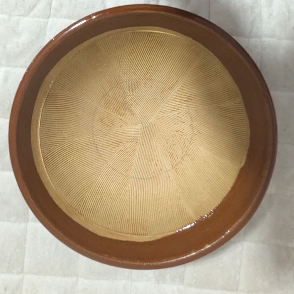 Rare vintage Handmade, Hand scraped Japanese ceramic bowl. One of a kind.